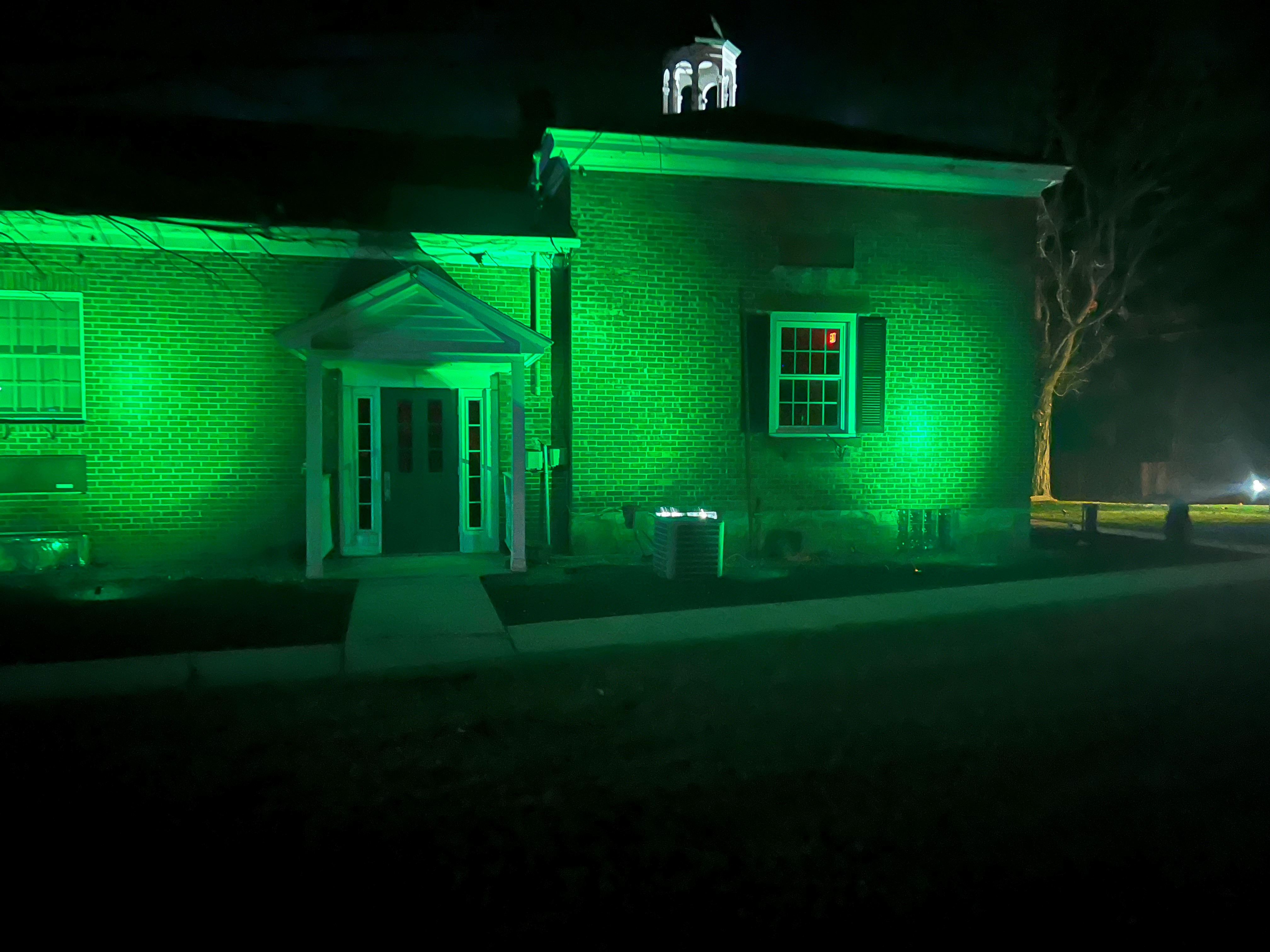 Image for Greenfield illuminates in green to support local veterans for Veterans Week