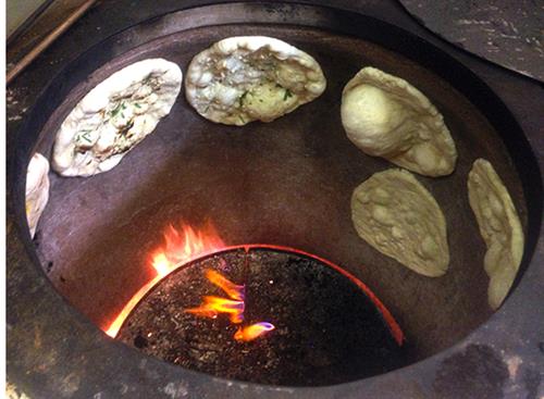 Indian Breads Cooked in Clay Oven 