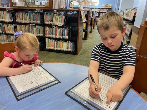 Skool of Fish Preschool classes works with students to get them Kindergarten ready. Students will write their names and learn the early steps to reading.