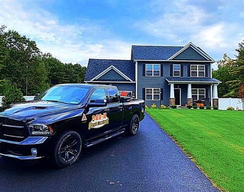 Gallery Image bug_u_truck_nice_house_grey_house.jpg