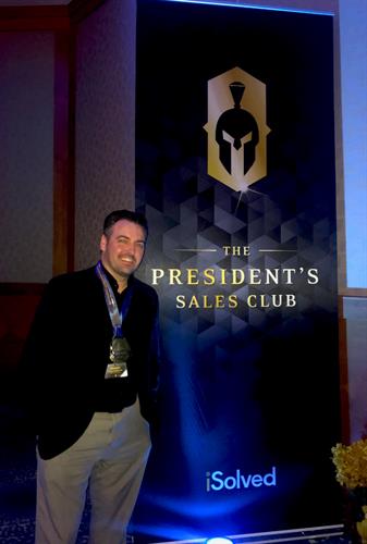Michael Maddalone, Director of Business Sales, wins the Presidents Club Award for sales from iSolved.