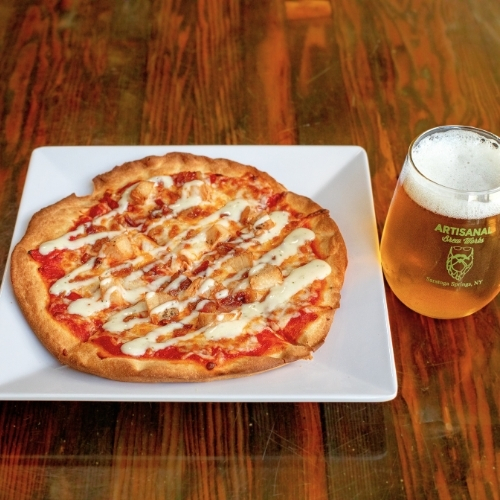 Buffalo Chicken Pizza, sous vide chicken, buffalo sauce, and blue cheese at Artisanal Brew Works, a Saratoga Springs restaurant known for elevated pub-style food