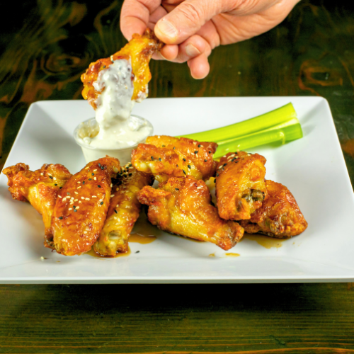 Baked wings with bold flavor at Artisanal Brew Works, a Saratoga Springs restaurant known for elevated pub-style food