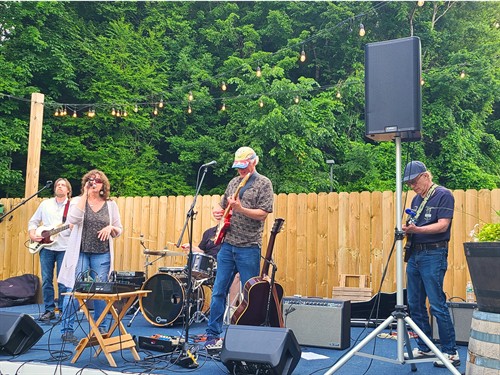 Live music fundraiser at Artisanal Brew Works in Saratoga Springs supporting Shelters of Saratoga on the outdoor Forest Stage.