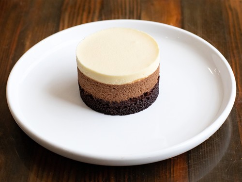 Triple chocolate mousse cake dessert at Artisanal Brew Works, a Saratoga Springs restaurant with indoor dining and outdoor dining on the Nature’s Edge Terrace.