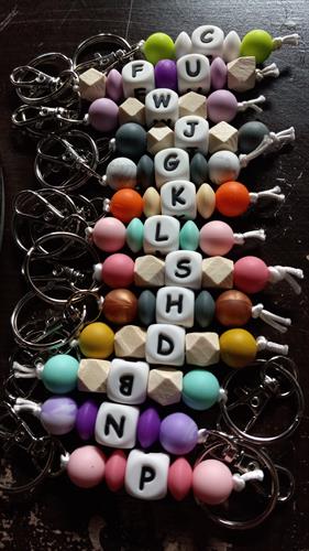 Keychains, pacifier clips, backpack clips, vent diffusers, badge clips (Simpkins Studios)