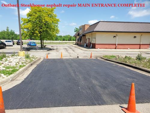 Asphalt cutout and repair done at Outback Steakhouse