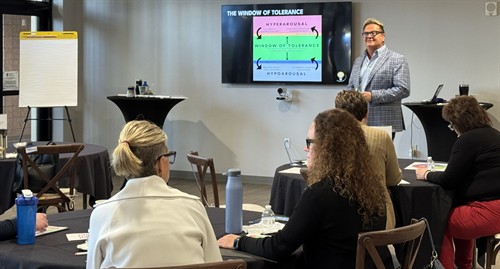 Bobby Hoffman leading a leadership and communication workshop through Thought Partner Services, helping organizations strengthen culture, customer service, and team effectiveness.