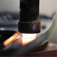 The Hot Upset forming and riveting process uses heat and pressure to form the fastener. The material being formed becomes malleable and collapses under pressure applied by the Powerhead. 