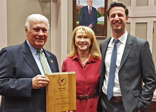 Our founder and lead wedding consultant Patrice Roulx receiving the "Best of Thumbtack" national award from Mayor Ted Gatsas