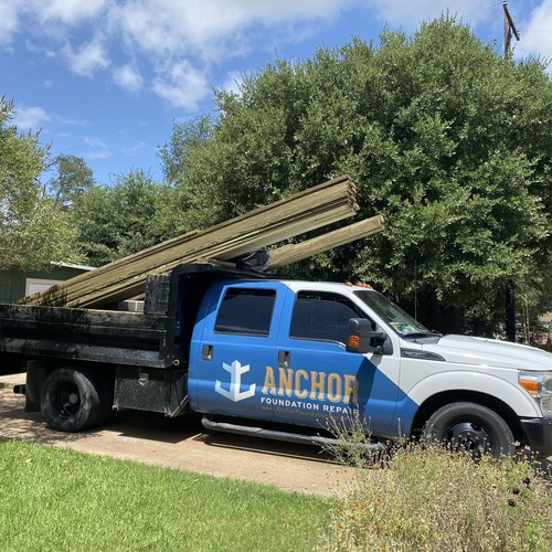 Load of lumber for crawl space foundation repairs