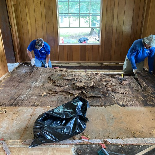 Subfloor work on a crawl space home