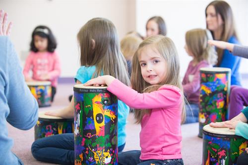 Gallery Image Photo-Kindermusik-TheLionGuard-Classroom-drums-girl-smile-4928x3280.jpg