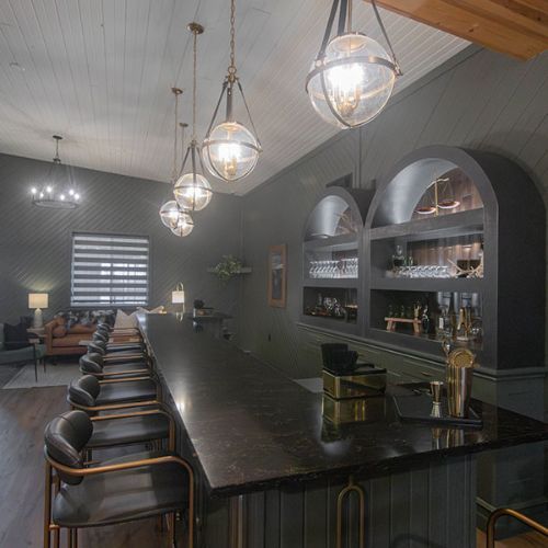 Main event area, bar is available for use with booking, glassware, ice machine, and bar sinks.