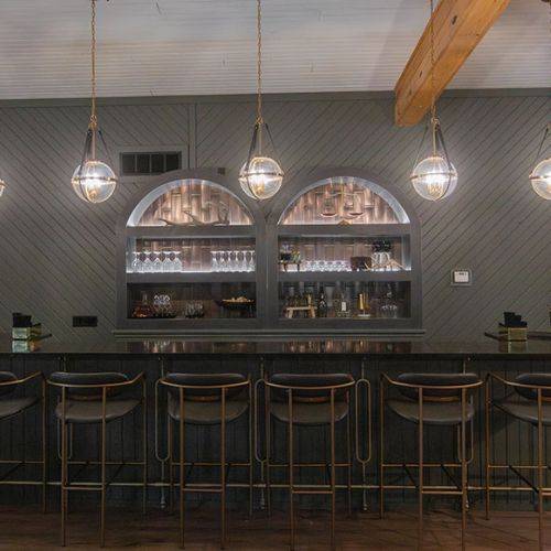 Main event area, bar is available for use with booking, glassware, ice machine, and bar sinks.