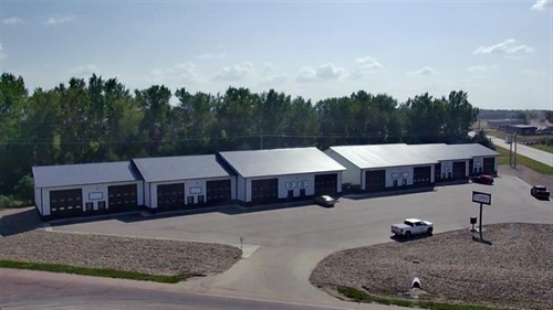 Gallery Image Whole_bldg_with_parking_and_sign.jpg