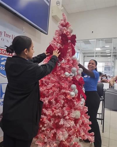 Scarlen & Agatha decorate the Honda Christmas Tree