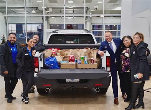 The Sales Team getting ready to deliver to the Reading food pantry 