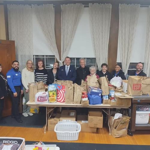 Reading Food Pantry Volunteers with Route 128 owner Dan Loggins and his Sales Team