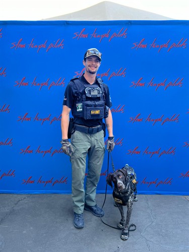 K9 BASHER TARR AND HANDLER DEREK SHELTON