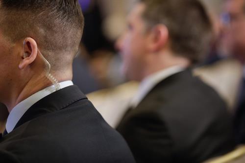 Security personnel monitoring attendees during corporate event security operation | Global Risk Solutions, Inc. Security personnel monitoring attendees during corporate event security operation | Global Risk Solutions, Inc.