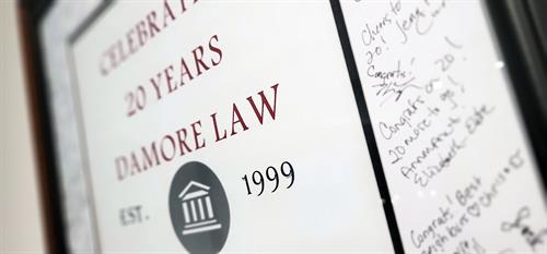 Gallery Image DaMore_Law_20_Years_Sign_New.jpg