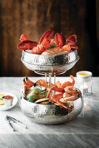 Seafood Tower: Split cold-water lobster tails, full lobster claws, jumbo shrimp, snow crab legs, green-lipped mussels.