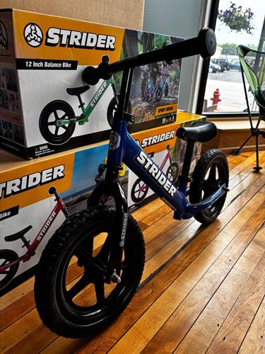 Strider balance bikes.