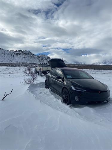 Tesla in a snow drift, no hitch? No problem. 