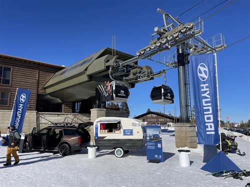 The Après Bar linked with a Hyundai Pallisades for on hill activations.