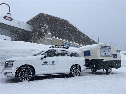 The Après Bar linked with a Hyundai Pallisades for on hill activations.