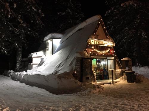 A-Frame Fine Wine and Spirits covered in snow.