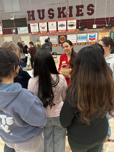 Executive Director Elizabeth Root with Mammoth High School Students at the spring 2026 Job Fair 