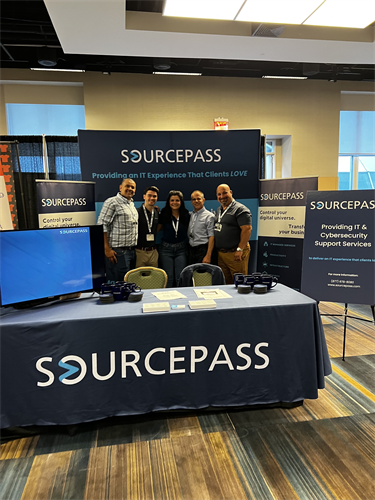 Gallery Image 2023-06_SBE_NYC_Sourcepass_booth_and_team_2.png