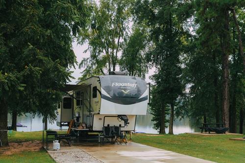 Nestle into one of our lakefront or sanctuary RV sites, surrounded by beautiful pines. Nestle into one of our lakefront or sanctuary RV sites, surrounded by beautiful pines.