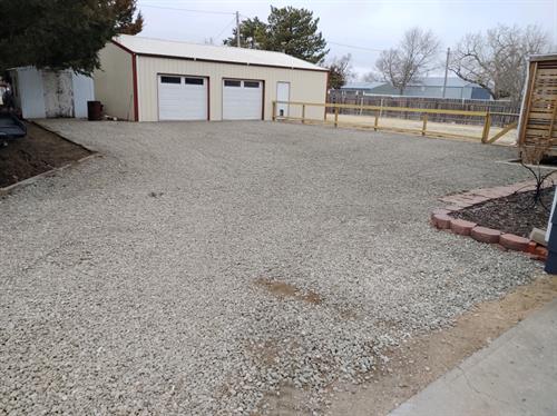We re-rocked this driveway/parking area