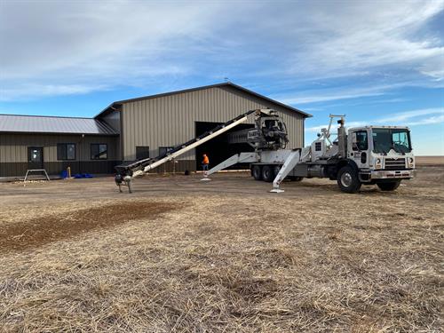 Belting - we can belt concrete, sand, dirt, mulch, and much more!