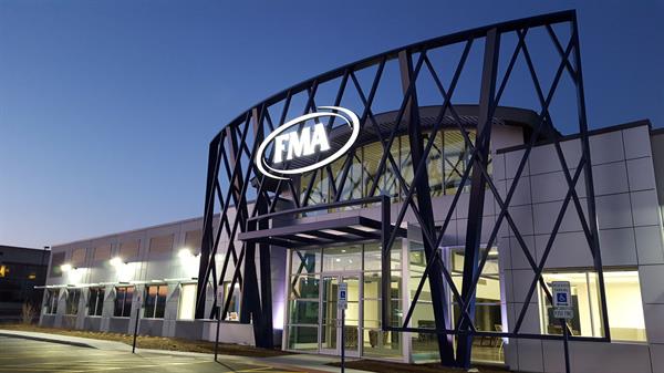 FMA's South entrance can be seen from I-90 and features a web of structural steel tubing that supports the FMA "swirl" logo.