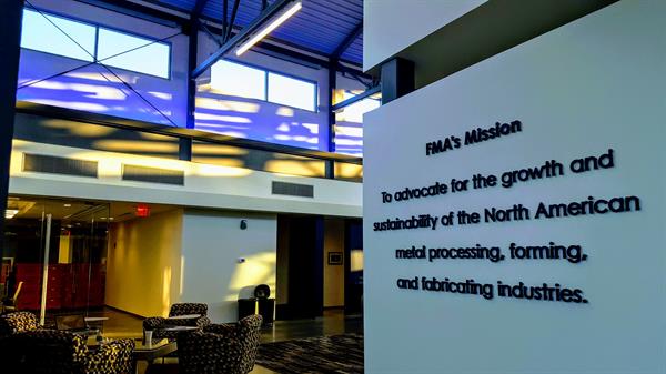 FMA's mission statement is posted in bold blue lettering just inside the North entrance, for all to see.