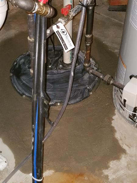 Restoration of old sump pit with new sump pump installation and lid 