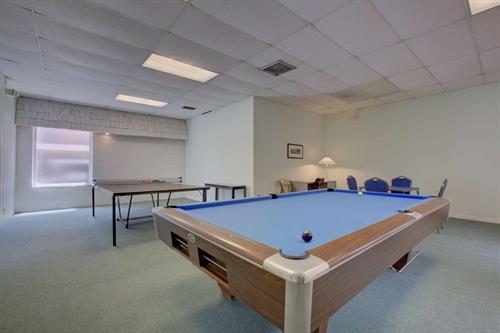 Our game room offers sports television, a pool table, picnic table and library.