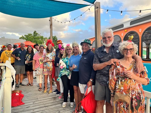 Murder Mystery Guests wait to board