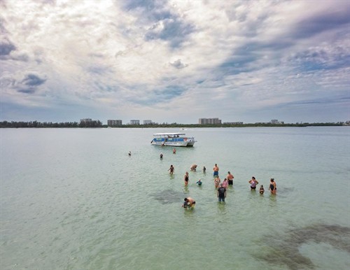 Sunshine, saltwater and a stop at the sandbar aboard Island Time.