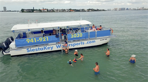 Siesta Key sandbar trips aboard Island Time, with dolphin watching, time to swim and plenty of fun on the water.