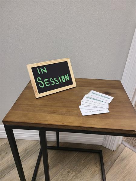 In Session - Please take a card - by appointment only