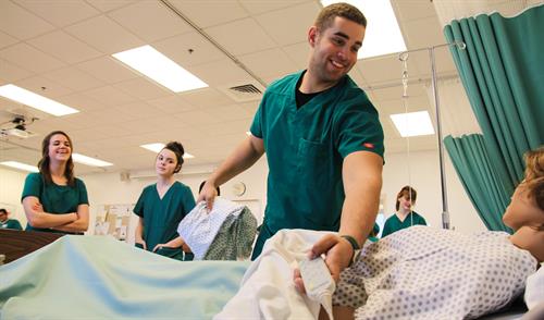 Durham Tech students practice nursing techniques at the Orange County Campus.