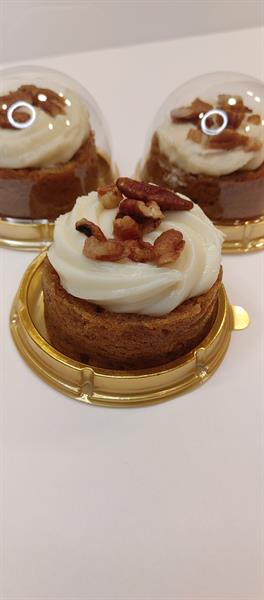 Petite Sweet Potato cakes with Cream Cheese Frosting and candied pecans.  These are delightful for wedding dessert tables.