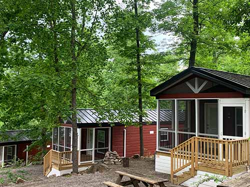 New Cottages sleep 6 with all of the comforts of home:  2 Bedrooms, Kitchen with microwave and full-size refrigerator, private bathroom and shower, and cable TV & Wi-Fi!