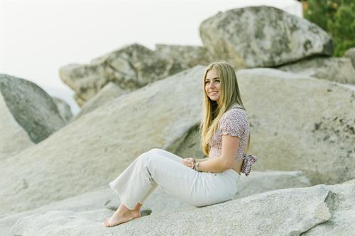 Senior Graduate girl photographed at Lake Tahoe on boulders