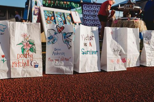 Luminaria bags with names of community memebers we have lost to cancer or that may be fighting currently. We REMEMBER their journey during the Luminaria Ceremony 